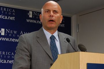 Professor Tim Canova