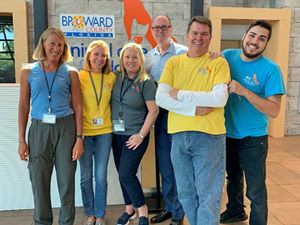 Left to Right: Lisa Hanron, volunteer, Susan Bates, volunteer, Lauralei Combs, Director, Commissioner Fisher, Mike Mullens, volunteer and Anthony Castaneda, Customer Service representative