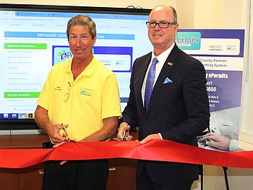 Pompano Beach Mayor Rex Hardin and Broward Commissioner Lamar Fisher at ePermitsOneStop Ribbon Cutting Ceremony