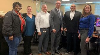 Left to right- Leah Coleman (BSO Dispatcher), Tara Gelsi (BSO Assistant Site Mgr.), Tony Sabin (Broward County 911 Communications Administrator), Commissioner Fisher, Brett Bayag (Assistant Director), Jenna DiPlacido (Broward County 911 Communications Mgr.)