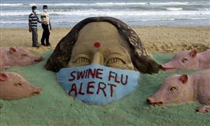 Sand Sculpture Flu alert on beach in India