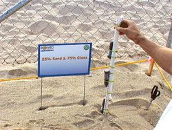 Glass sand tested on beach