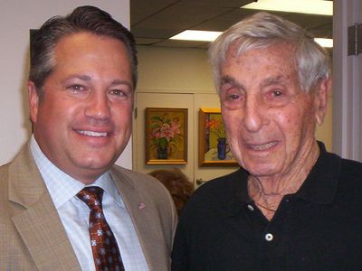 District 4 Broward Commissioner Chip LaMarca and Friends of the Galt Ocean Mile Library President Herman Gardner