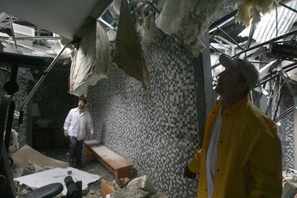 Maintenance Supervisor Ronnie Cook Checks Mikvah Damage