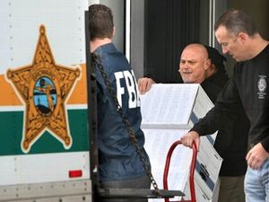 Health Dept, FBI, DEA, BSO and Fort Lauderdale Police load Impounded Documents During Raid