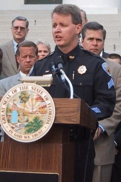 Fort Lauderdale Police Captain Todd Penney, Governor Jeb Bush and Lt. Governor Frank Brogan