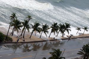 Sandy Storm Surge Slams Beach