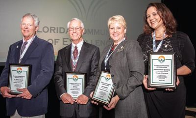 Pat Quintero (far right) and other Managers of Excellence