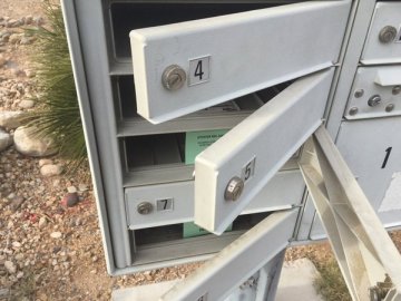 Scammers broke into victims' mail boxes