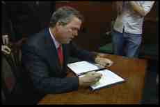 Governor Bush Signs Insurance Bill