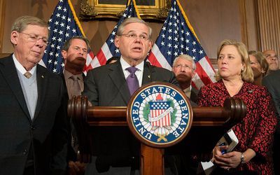 Senators Johnny Isakson, Robert Menendez and Mary Landrieu