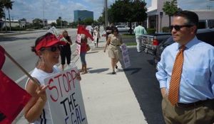 Broward Commissioner Chip LaMarca with STOPPNOW Demonstrators