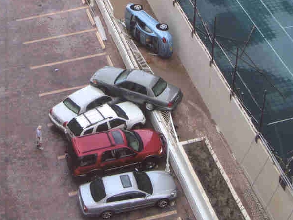 Mini-burst Blows Car From Commodore Deck Over Wall to the Southpoint Deck