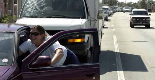 Pushing Cars into Gas Station on Federal Highway