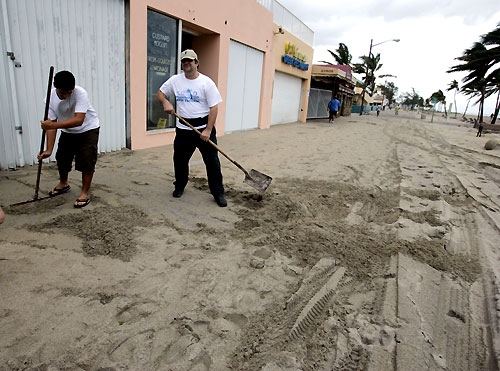 Ocean Front Businesses Buried in What Used to be the Beach